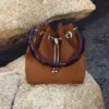 Bon Bon Tan Suede Bucket Bag with Bead Closure and Tortoishell Handle