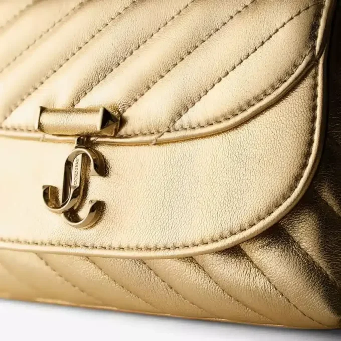 Curve Cross Body Small Gold Quilted Metallic Nappa Leather Crossbody Bag